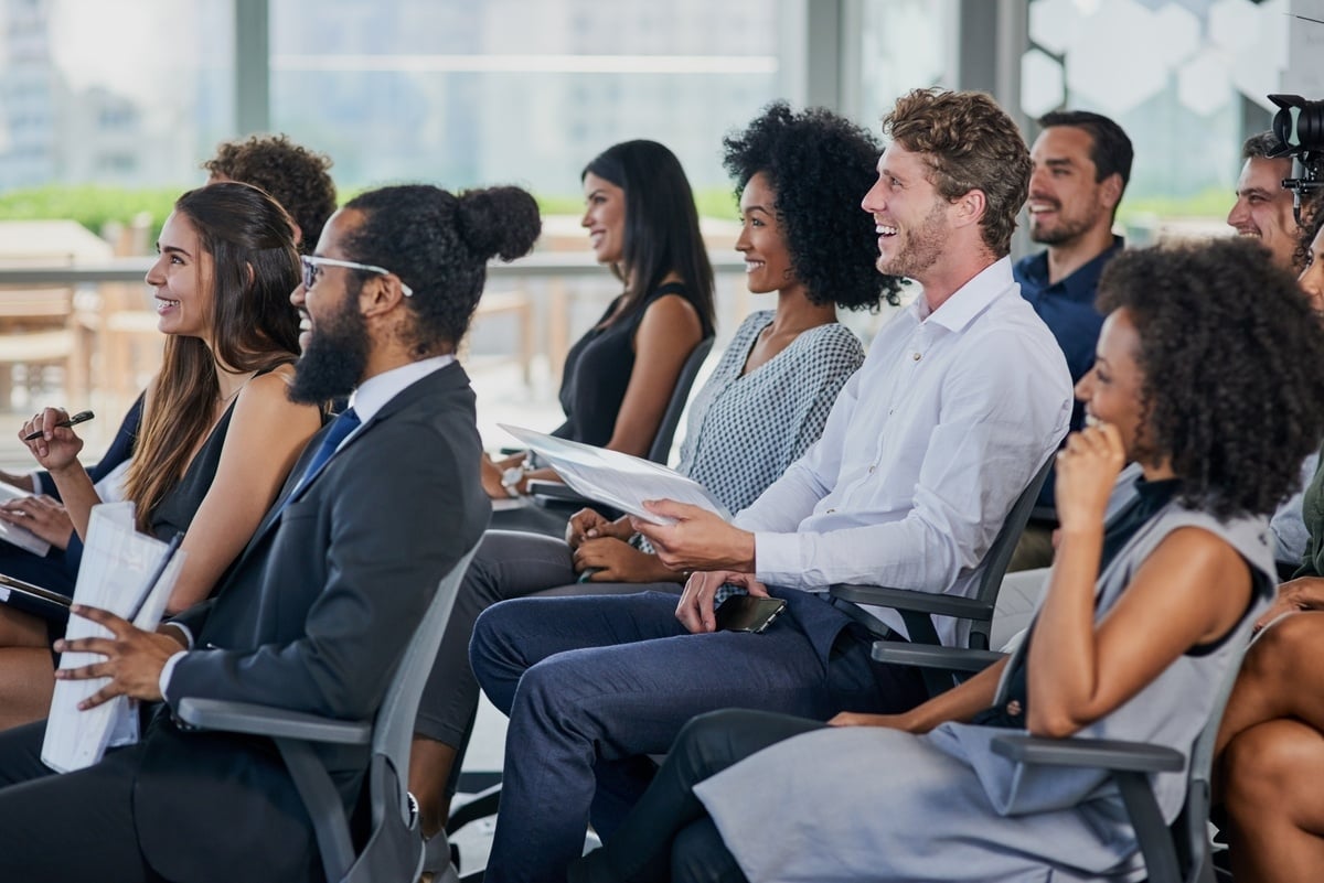 Professionals sitting in a seminar