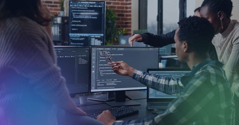 IT service professionals working on a joint desk